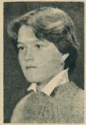 Portrait photograph of Lidia Elcu, a young woman looking towards the left