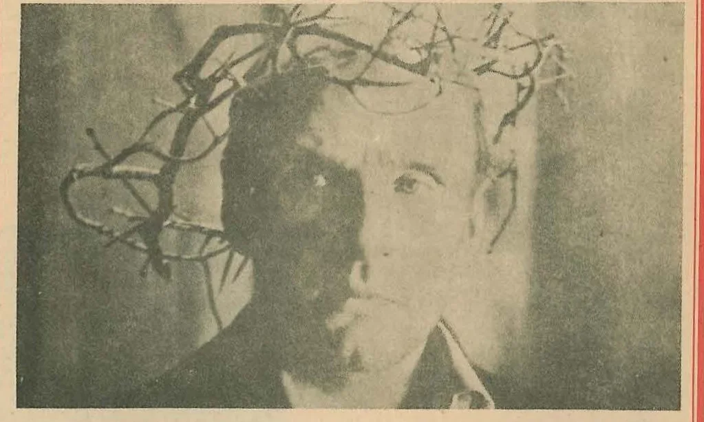 A sepia-toned landscape illustration showing a desolate, dusty terrain with a distant structure or figure, evoking a sci-fi wasteland atmosphere.